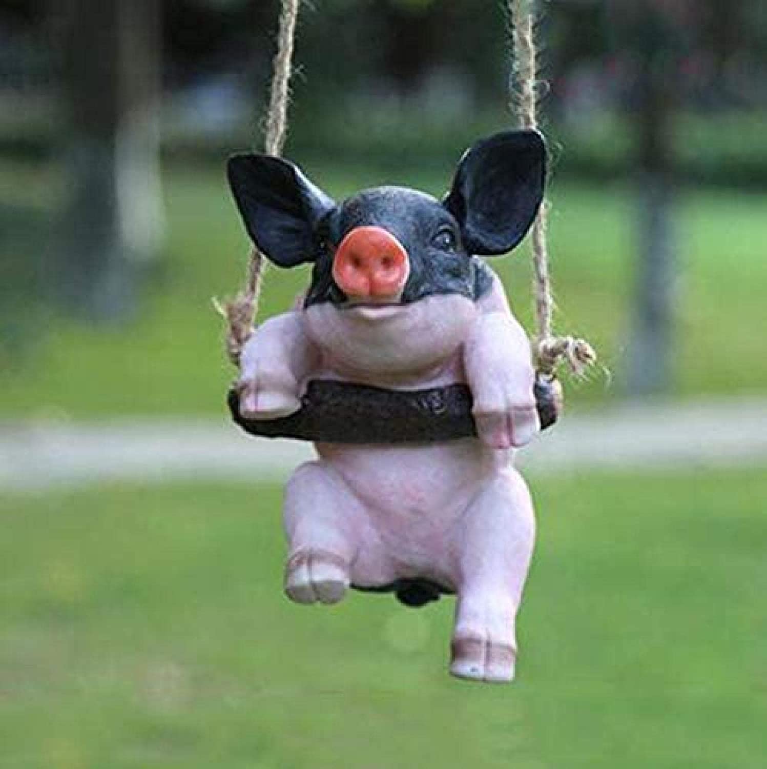 Swinging Garden Pig Statue: These Piggies Swing During Windy Days!