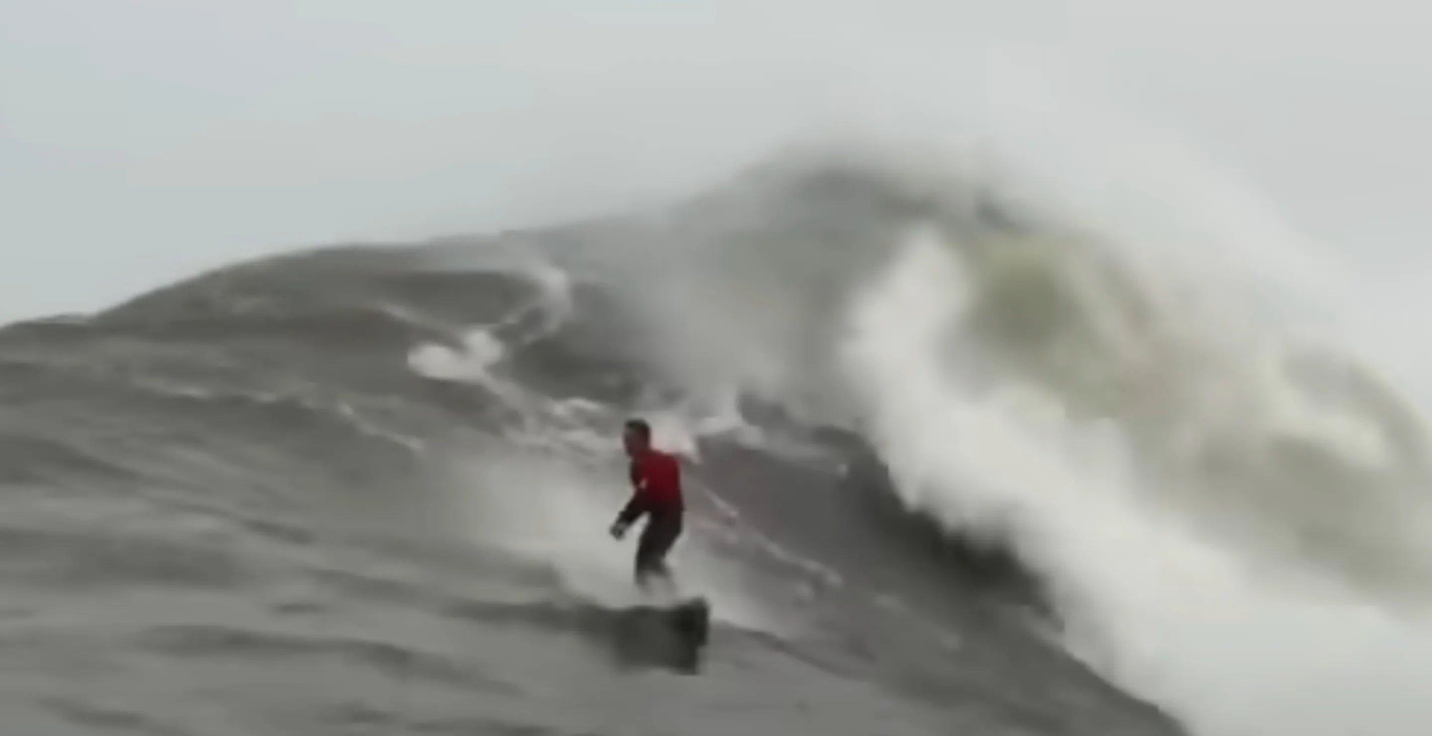 Surfer Rides Possibly Record Breaking Monster Wave In Insane Video