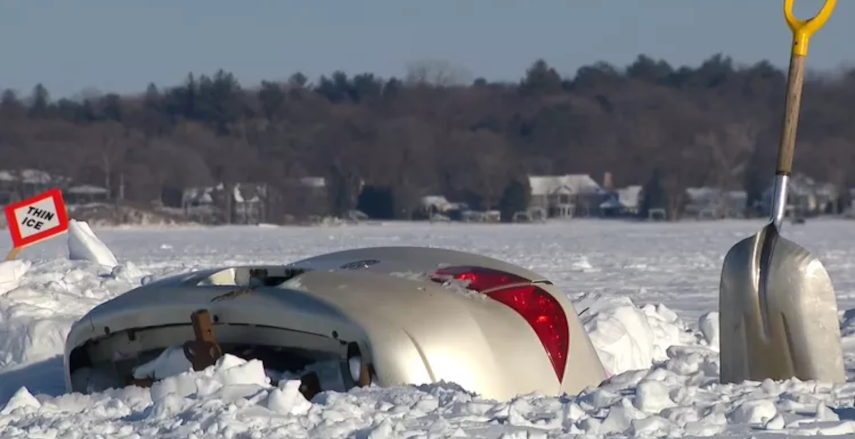 Sedan Slowly Sinking Into A Frozen Minnesota Lake Goes Viral