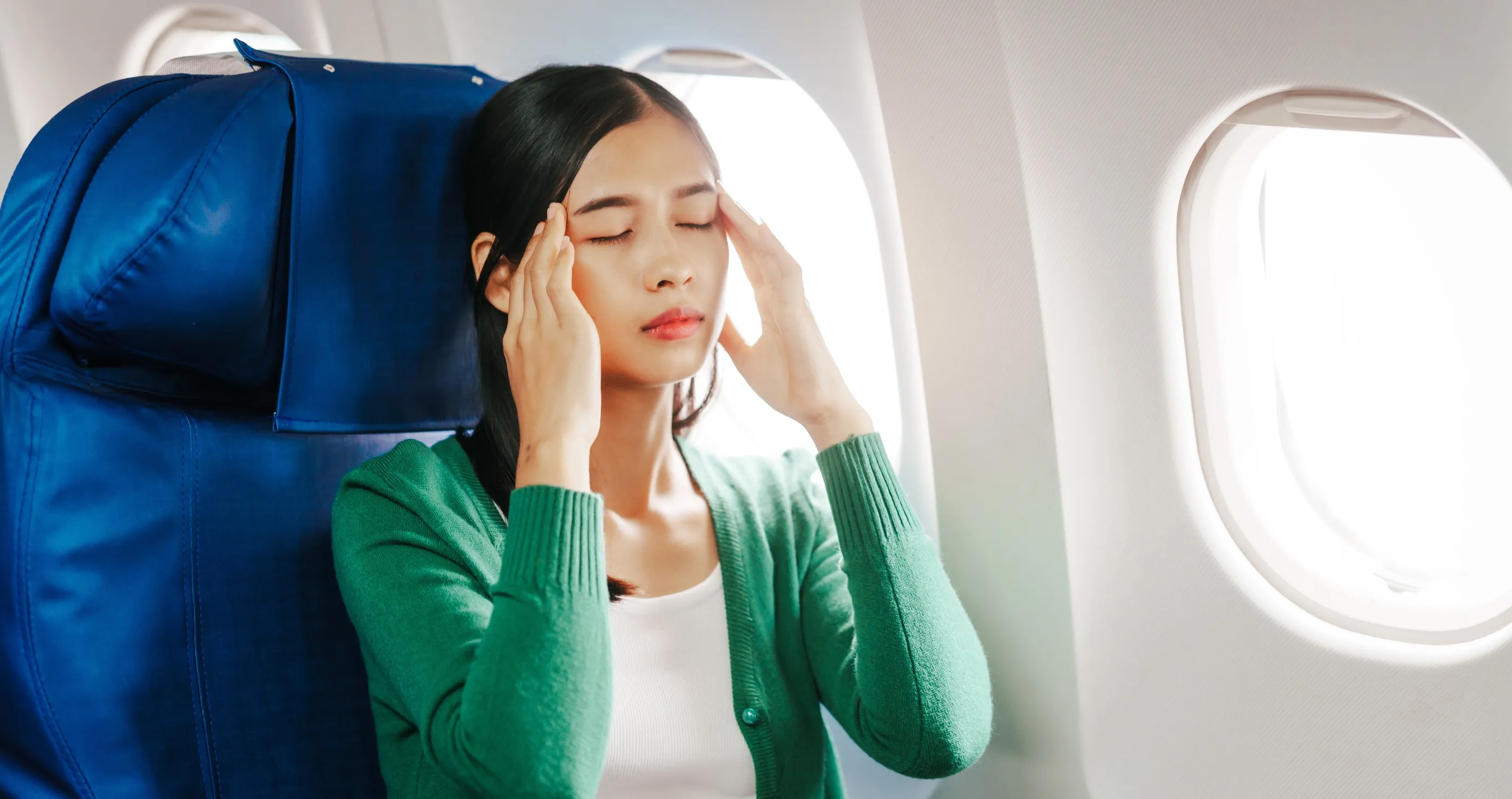 flight passenger freaks out when warm hard object touches her elbow